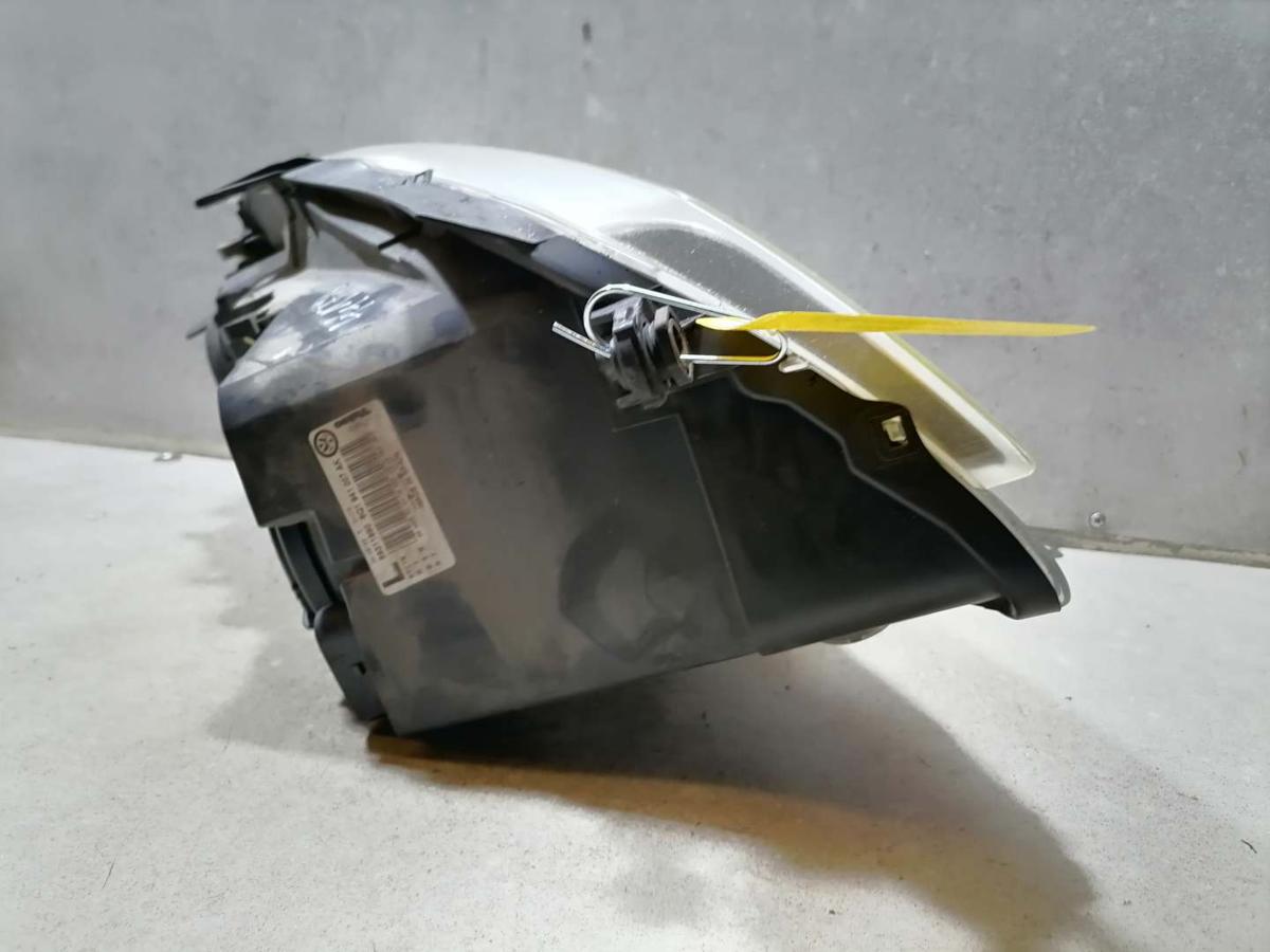 VW Polo 9N3 original Scheinwerfer vorn links Halogen oberhalb leicht vegilbt Bj.2005 VW Polo 9N3 original Scheinwerfer vorn links Halogen oberhalb leicht vegilbt Bj.2005